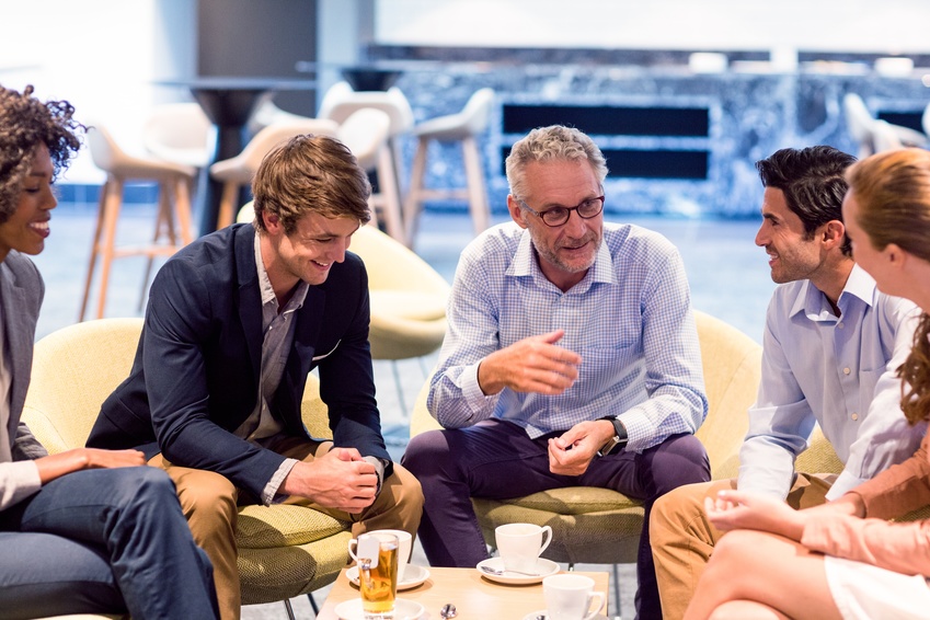 Business people having a discussion in cafeteria 759275