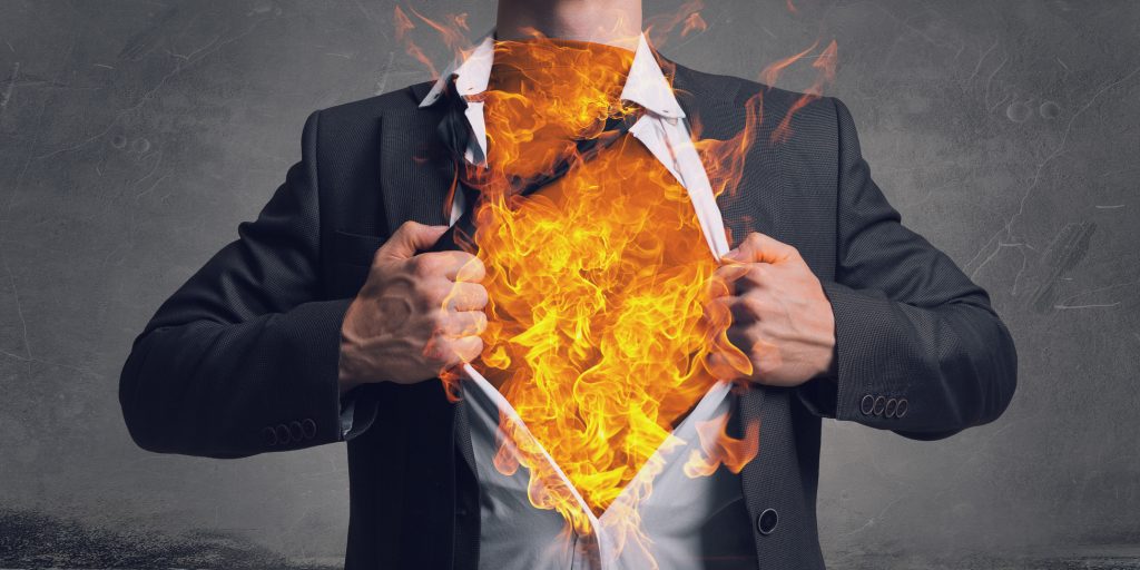 His super abilities. Mixed media Businessman tearing off his shirt on chest. Mixed media